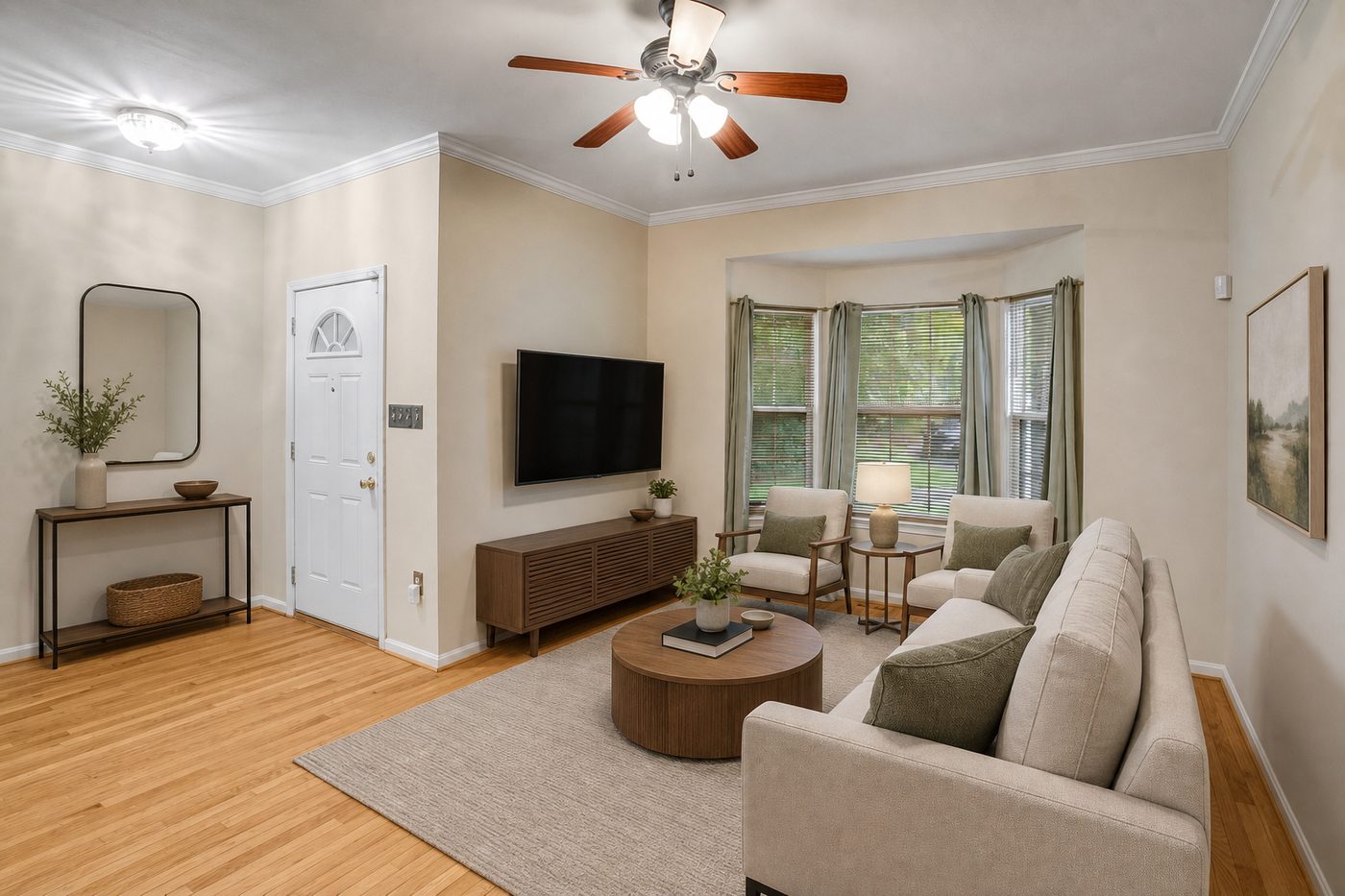 Virtually staged living room with bay windows and fireplace